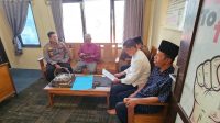 Kapolsek Sei Mandau laksanakan giat cooling system dengan penyuluh agama Kantor urusan agama (KUA) kecamatan sungai Mandau 