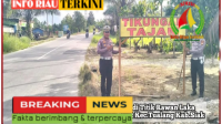 Peduli Keselamatan Unit Lantas Polsek Tualang Pasang Spanduk Daerah Rawan Laka Lantas.