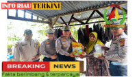 Sat lantas polres siak sigap  berikan bantuan kepada korban kebanjiran di kacamatan mempura