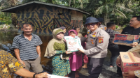 Polsek Kandis Gelar Kegiatan Peduli Bencana Banjir di Kampung Pencing Bekulo