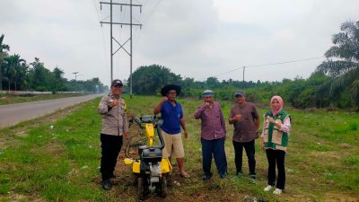 Dukung Ketahanan Pangan, Polsek Tualang Kawal Pengolahan Lahan Jagung 1 Hektare di Kp. Pinang Sebatang